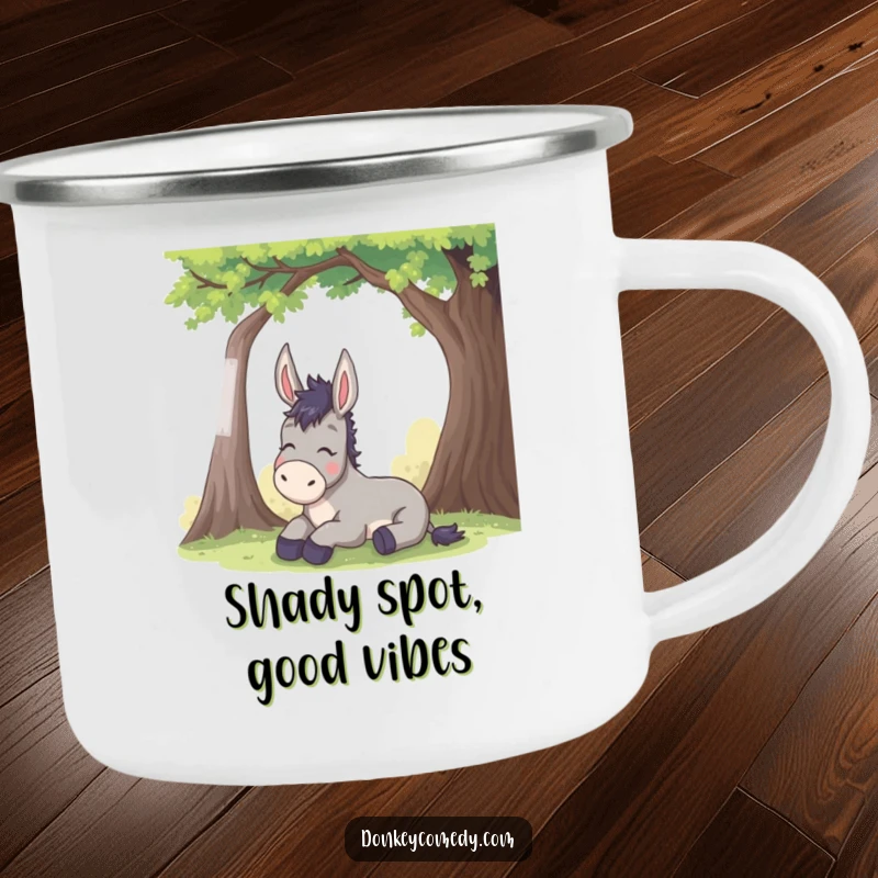 Funny donkey camping mug shows a happy mule sighing under a tree, designed for outdoor use and offering humorous relief.