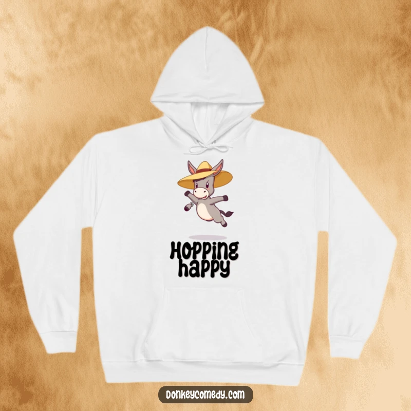 Funny bouncy donkey wearing a straw hat, jumping, featured on a warm hoodie, a humorous and comfortable gift.
