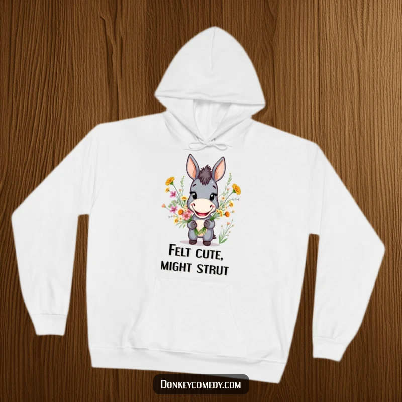 Funny hoodie featuring a donkey with a broad smile holding a wild flower bouquet, perfect for cozy, humorous moments.