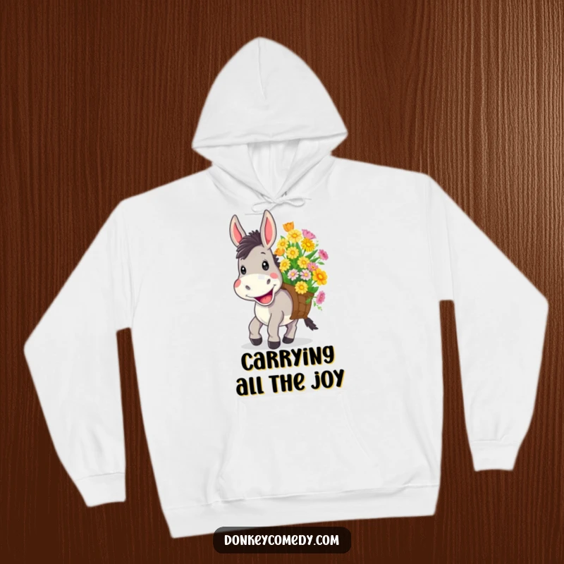 Funny hoodie featuring a donkey with a wide, cheerful grin carrying a load of colorful flowers, offering cozy happiness.