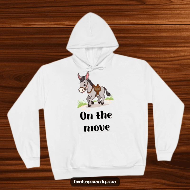 Funny Donkey Trotting Hoodie: A warm hoodie featuring a donkey joyfully trotting along a path with a saddle, promoting funny journeys.
