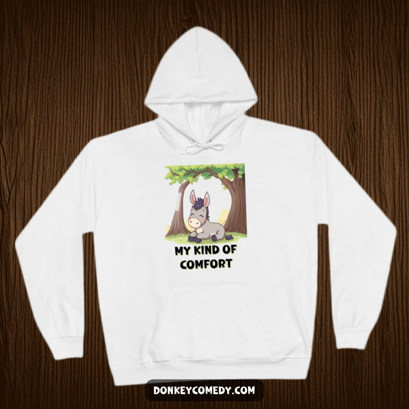 Funny donkey hoodie features a mule taking a deep, relieved sigh while lounging under a shady tree, embodying ultimate comfort and humor.