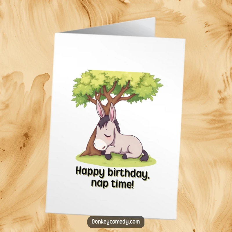 Funny Free Printable Birthday Card: A sleepy donkey rests peacefully under a shady tree, wishing a tranquil birthday.