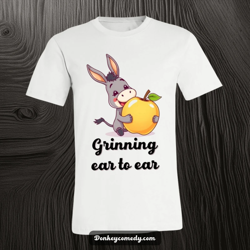 Funny t-shirt depicting a donkey with a wide, excited grin, joyfully accepting a huge apple.