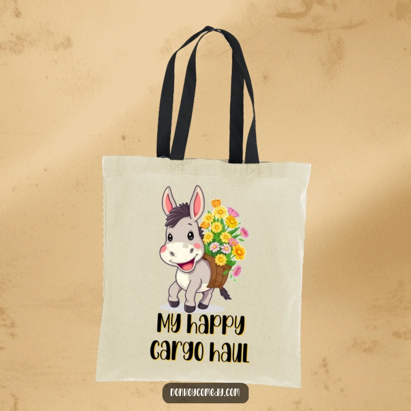 Funny tote bag showing a donkey with a wide, cheerful grin happily carrying a large bundle of colorful flowers.
