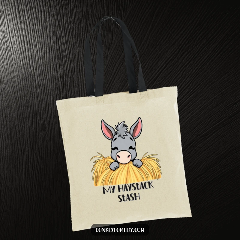 Funny Donkey Tote Bag: A donkey peeks from a haystack with a playful wink, showcasing its charming personality.