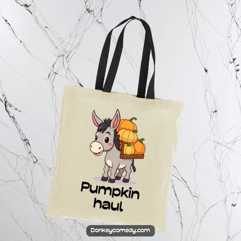 Funny Donkey Pumpkin Haul Tote Bag: A sturdy bag with a determined donkey carrying colorful pumpkins, perfect for funny fall excursions.